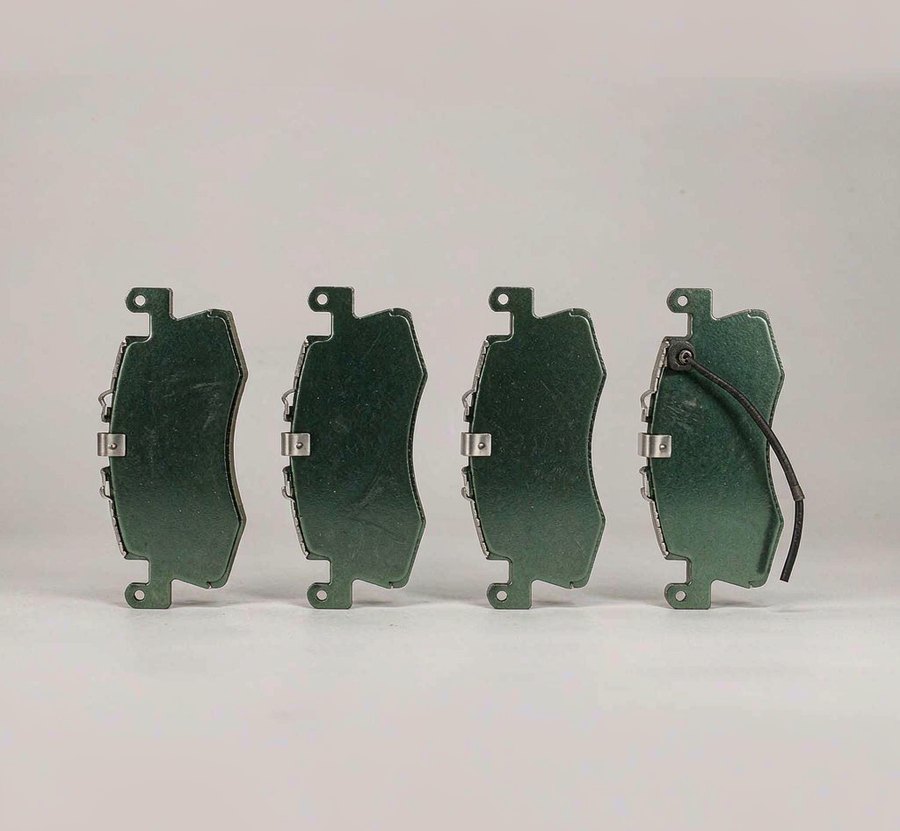 Low-metallic brake pads with wear sensor